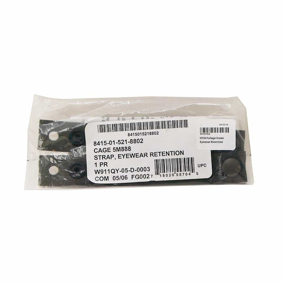 A pair of black eyewear retention straps inside a clear plastic bag with a white product label, photographed on a white background.
