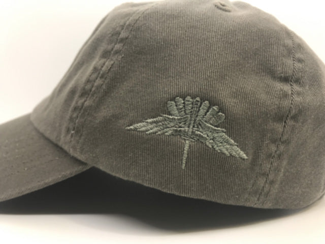 An olive green cotton baseball cap with a matching embroidered leaf design on the side, shown against a plain white background.
