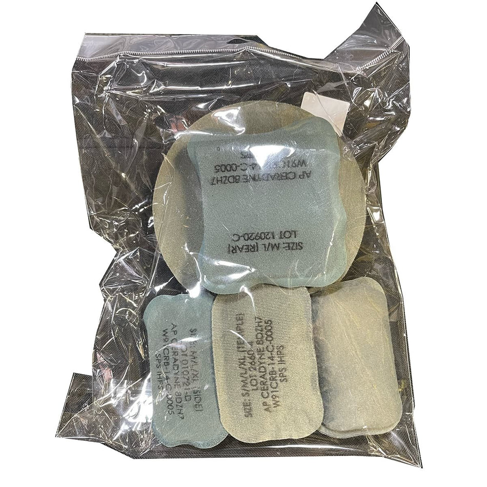 A clear plastic bag containing ACH Helmet Pads, photographed on a plain white background.