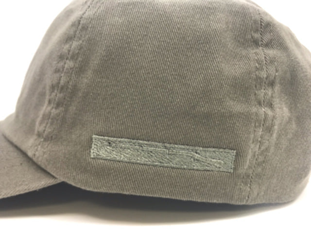 Gray cap with a rectangular patch on a white background