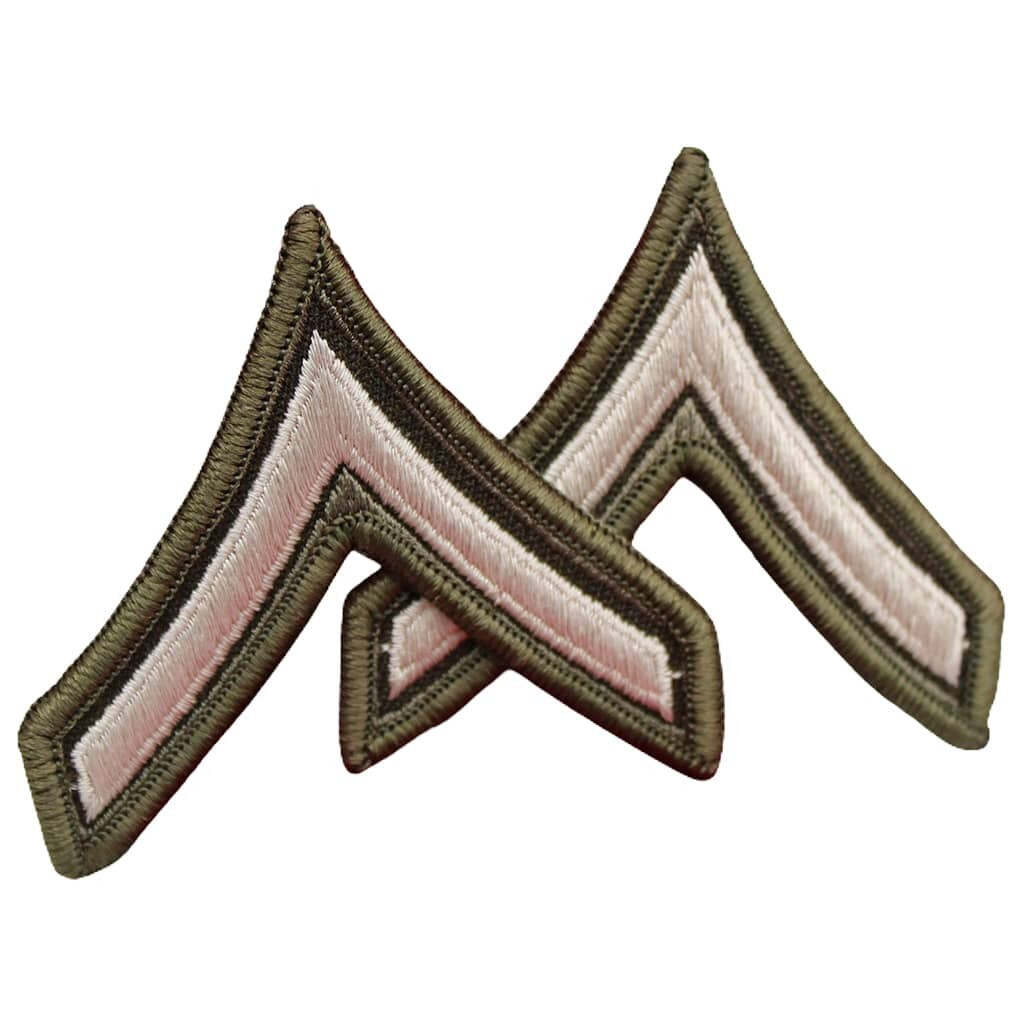 Two embroidered chevron insignia patches in olive drab and light pink, arranged in an overlapping V-shape on a plain white background.