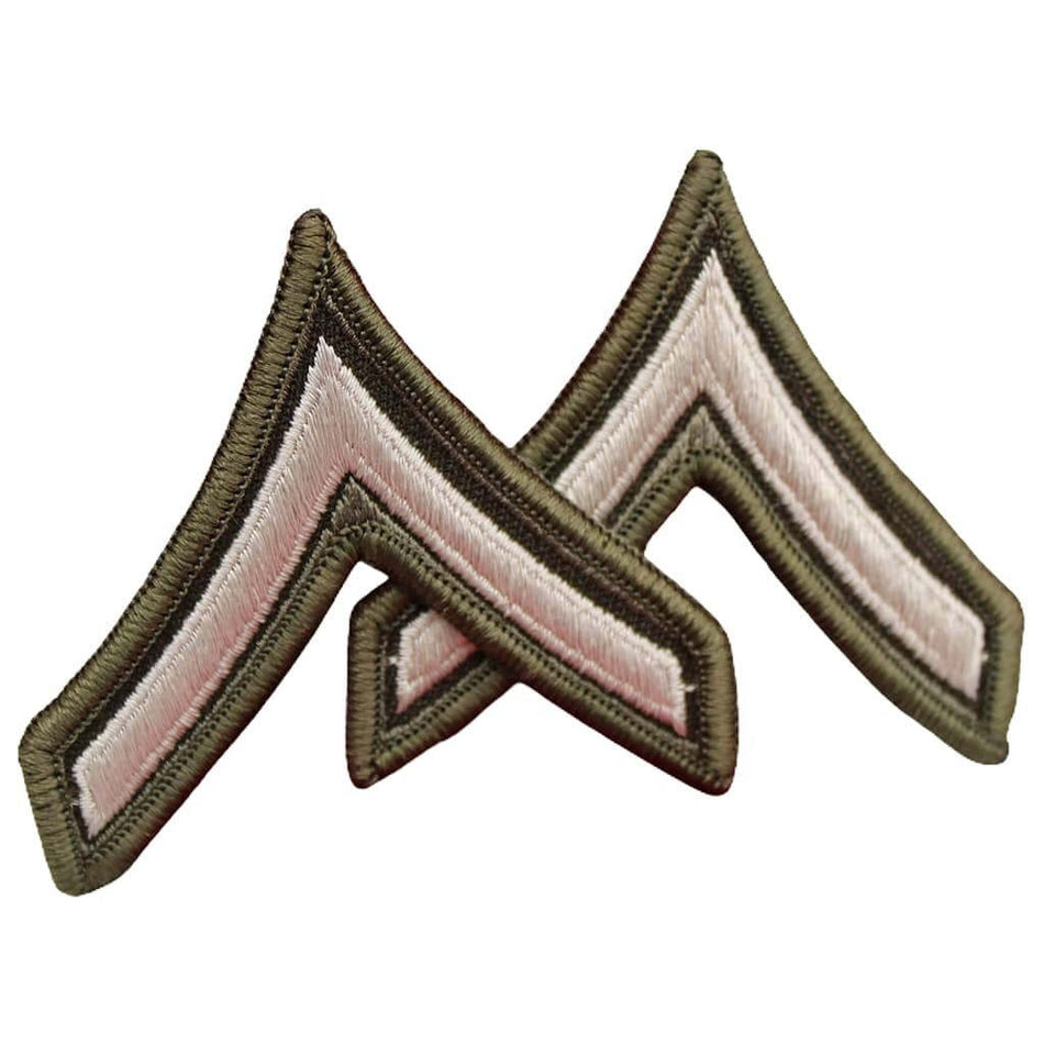 Two embroidered chevron insignia patches in olive drab and light pink, arranged in an overlapping V-shape on a plain white background.