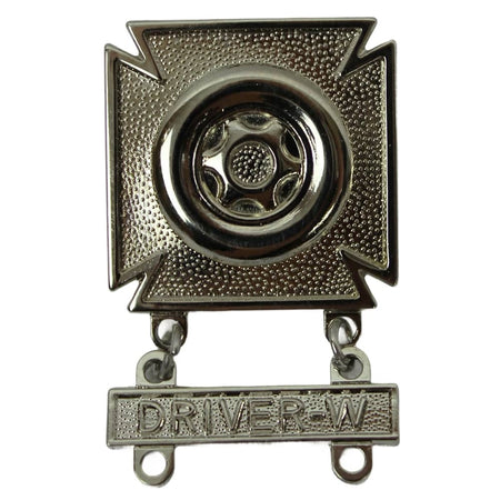 Metallic badge with a central circular design and 'DRIVER W' text on a white background