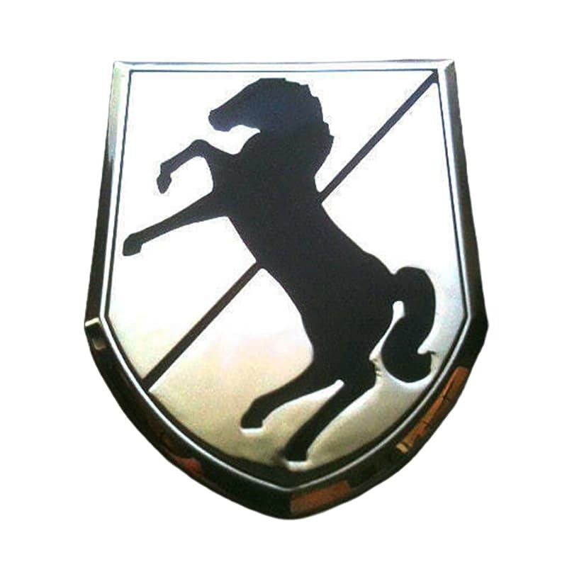 A shield-shaped metallic emblem featuring a black silhouette of a rearing horse on a silver reflective background, isolated on a white backdrop.