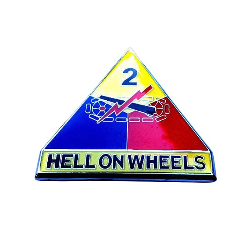 A triangular enamel pin with a yellow top section featuring the number 2, a blue and red lower section, and a yellow banner at the bottom reading 'HELL ON WHEELS' in black letters.