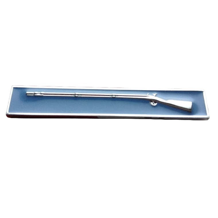 A miniature silver metal toy rifle, designed to look like a shotgun, displayed inside a long, rectangular blue presentation box on a plain white background.