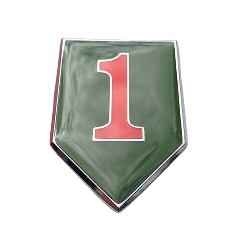 A shield-shaped green enamel pin or badge featuring a large red number 1 outlined in white, with a silver-toned metallic border.