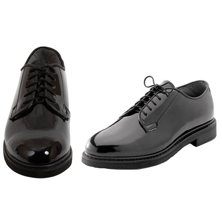 A pair of glossy black patent leather lace-up dress shoes, shown from the front and side angles on a plain white background.