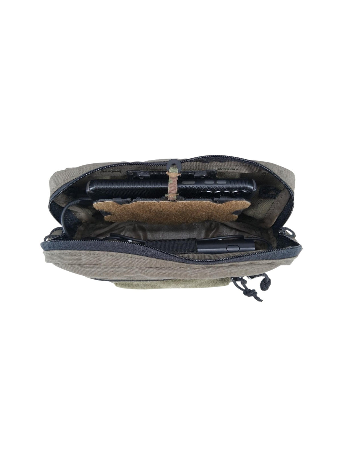 An open tactical pouch or organizer bag in olive drab and black, showing its interior compartments with a tan corduroy-like pad and dark gear inside, isolated on a white background.